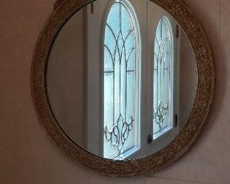 $30, Round ornate mirror