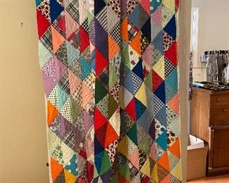 Double sided Quilt has some stitches coming loose on one end
