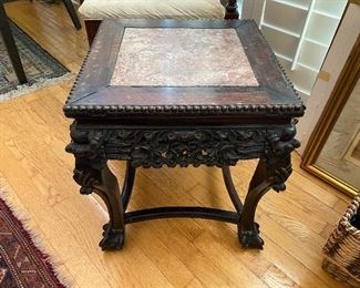 ornate square table with marble insert