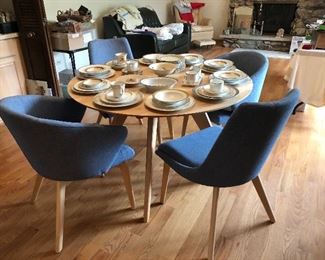 Like new modern Canadel Downtown series birch kitchen table with chambray blue upholstered chairs