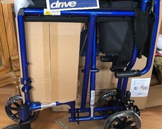 Brand new in box DRIVE lightweight transport wheel chair