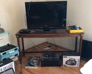 narrow sofa or media table, various electronice