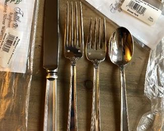 “Pantheon” la Preference by Tuttle sterling silver flatware. New in packaging - total of ( 8) 4 pc place settings
