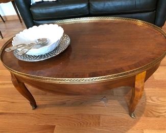 vintage Baker Furniture oval coffee table with brass accents and matching side table