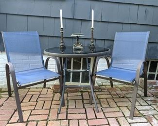 OK, due to our fabby leadership in this country, we are not currently welcome in Europe, BUT you can pretend to be in the Tuileries garden, sipping lattes and gnawing on buttery croissants. Fifi, get back here! 3-piece set of bronze finish aluminum breakfast set, pair of chairs and glass-topped table.