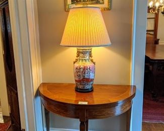 Nice, inlaid wood demilune game table, wth vintage Asian porcelain table lamp.