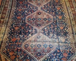Wonderful vintage Persian hand-woven rug, measures 7' 1" x 10' 3".