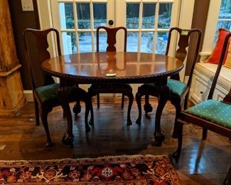 LOVE the size of this vintage mahogany oval breakfast table. It has ALL the right things - pie crust edge, oval shape and large, nicely carved ball and claw feet; set of four matching side chairs.
