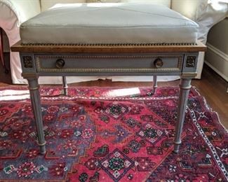 Lovely French leather-topped ottoman, with brass nailheads and single drawer.