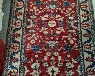 Vintage Persian hand-woven wool Persian design rug, measures 3' 9" x 5' 6".
