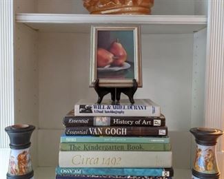 Several wonderful coffee table books in this sale, a pair of vintage Italian hand-painted/marble candlesticks, original oil on canvas pears and one of a pair of vintage English porcelain lions.