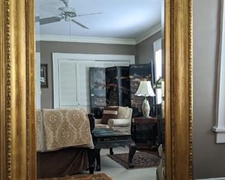 HUGE gold gilt wood mirror, with beveled glass- bring a crane - this thing is HEAVY!! Measures 6' 4"T x 4' 9"W.
