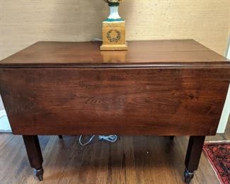 Vintage drop-leaf wooden table.