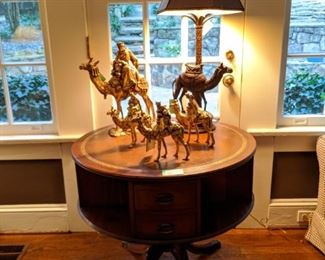 Wonderful tooled leather-topped 1940's mahogany lazy susan library table, with 8 drawers.