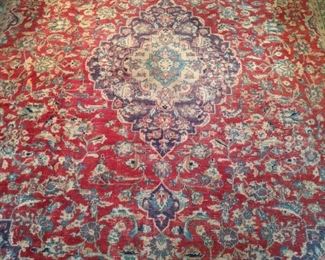 Vintage Persian Tabriz rug, hand-woven, 100% wool face, measures 7' 3" x 10' 4".