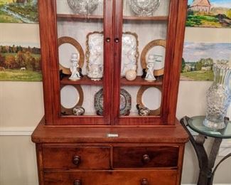 Antique, 2-piece French china cabinet, with wavy glass door panes. The measurements are: 6' 10" T x 3' 6"L x 1' 5"D.