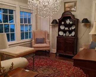 Wonderfully lit sitting room, with pair of pigskin upholstered wingback armchairs, vintage French walnut display cabinet, walnut Senatorial lectern.