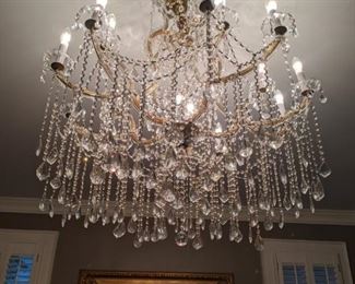 The master bedroom is well lit with this magnificent 16-light Italian Murano crystal chandelier.