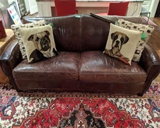 Satisfyingly opulent distressed leather couch - very comfy!
From Four Hands Furniture Co., Austin, TX; measures 6' 6"L x 3'D x 34"T.