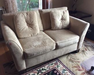 suede love seat. $ 225.00