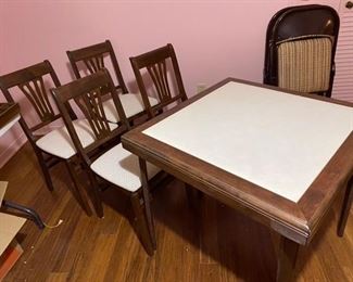 68.	4 Chairs & Folding Bridge Table  $120