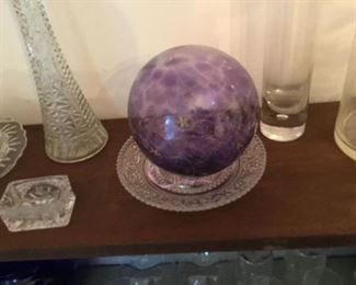 More glassware and large purple glass globe
