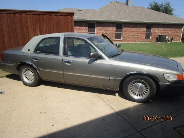 2000 Mercury Grand Marquis, 91k miles.  New battery, interior has soft leather seats and is in excellent condition.  