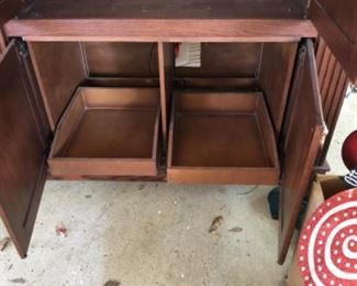 Inside of bottom of entertainment center