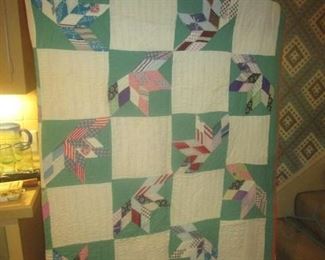 Hand stitched quilt. stains