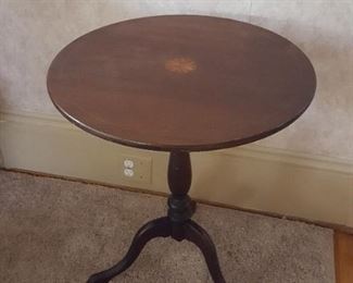 Inlaid tilt top candle stick table