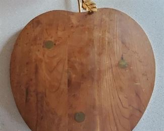 Walnut Apple cutting board designed by Ernest John