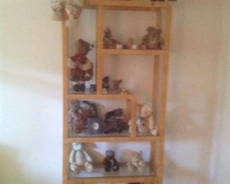 Woven wicker shelving unit with glass shelves.  Measures 36" wide x 14" deep x 78" tall.  Presale $65