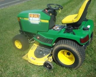 John Deere 445 tractor with reserve and subject to prior sale.