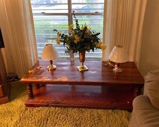 Double Recliner Sofa, Lamps, Flat Screen T.V., T.V., Stand, Rectangle Coffee Table, Silk Floral Arrangements