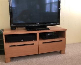 TV and TV stand with drawers. Sold. 