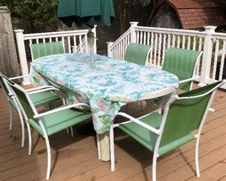 Outdoor table and 10 chairs. 