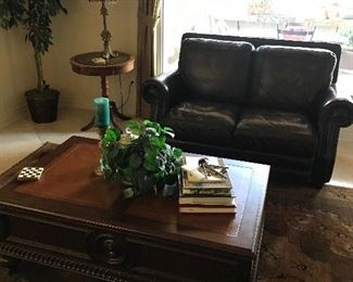 Leather love seat matches couch. Like new condition 