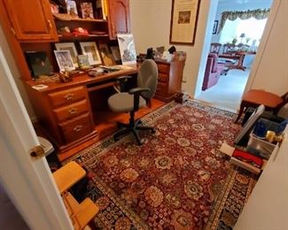 High back storage hutch desk with side secretary surface and storage.medium oak, oriental rug