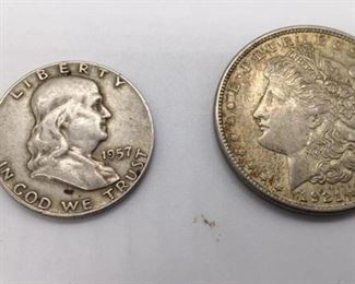 https://connect.invaluable.com/randr/auction-lot/1921-morgan-silver-dollar-and-1957-1-2-dollar_6314007A16