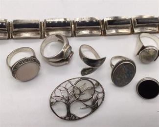 https://connect.invaluable.com/randr/auction-lot/nice-lot-of-silver-rings-and-bracelet_DEA436CAA1
