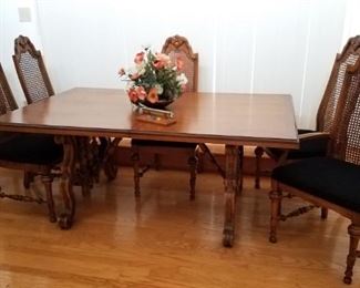 Dining table with nice streacher base. Six matching chairs.