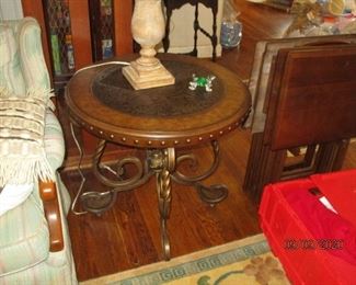 one of two matching side tables