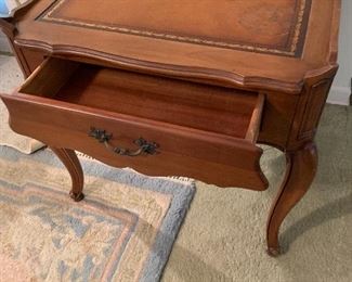 Leather top wooden  end table/drawer..   spot on right side of leather     Now selling $40.00 was $90.00