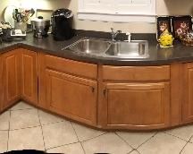 Panoramic view of the kitchen. Many small appliances.