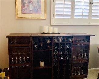 Mid century danish modern dry bar cabinet with copper inlay.