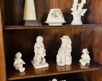 Vintage chalkware cherubs and other decorative pieces.
