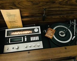 Vintage Magnavox console stereo - am/fm radio, 8 track, record player turntable.