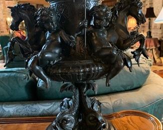 close up pic of cherub and horse bronze lamp