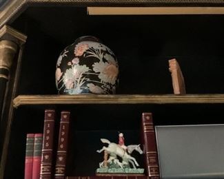 Ginger jar, leather bound set of encyclopedias, and horse racing bookends (there are 2)
