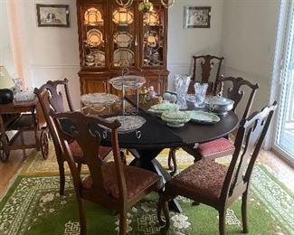 Harden Breakfront, Beveled Glass Dining Table with custom pad. 6 Chippendale Style Chairs to include 2 Captains Chairs